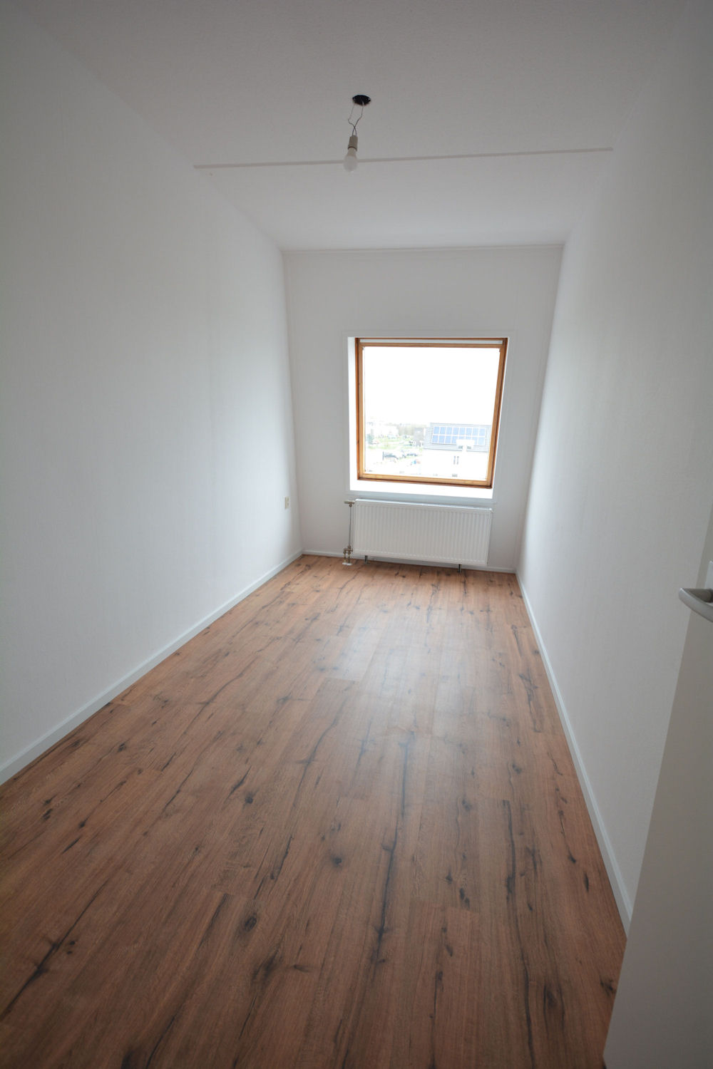 Kleine slaapkamer boven